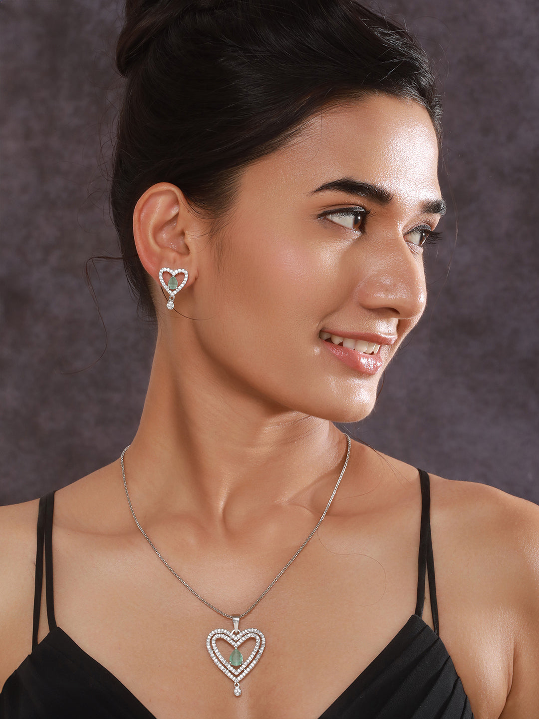 Jazz and Sizzle Silver-Tone Heart Shaped American Diamond Pendant Necklace Set with Green Stone