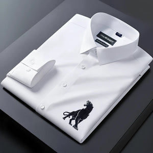 White dress shirt with a black lion emblem on a dark gray background