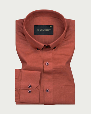 A brown, long-sleeved, button-down linen shirt by Frankshirt laid out flat on a white background.