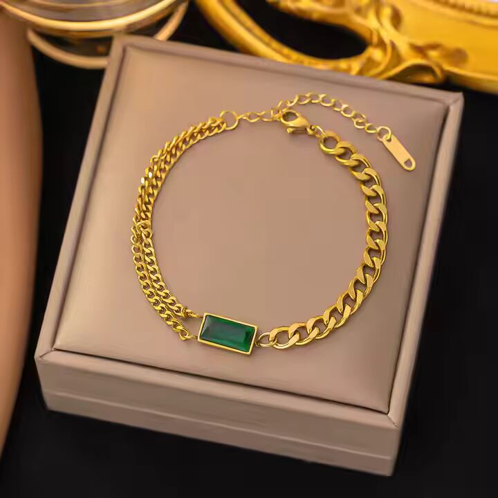 Jazz And Sizzle Gold Plated Green Stone Studded Stainless Steel Chain Bracelet