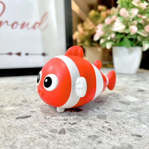Red Fish 2 in 1 Sharpener and Eraser on a Marble Surface with Flowers in the background - Tinyminymo