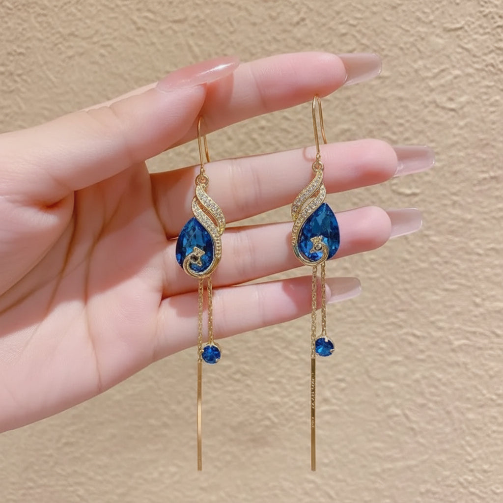Jazz And Sizzle Gold Plated and Blue Stone Studded Long Danglers Earrings