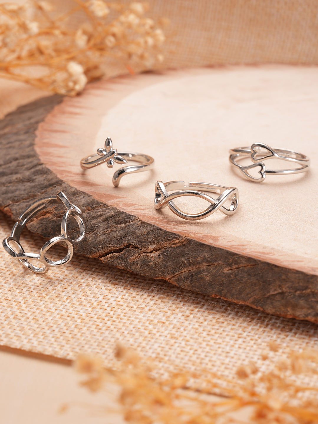 Jazz and Sizzle Silver-Plated Set Of 4 Stainless Steel Adjustable Finger Rings