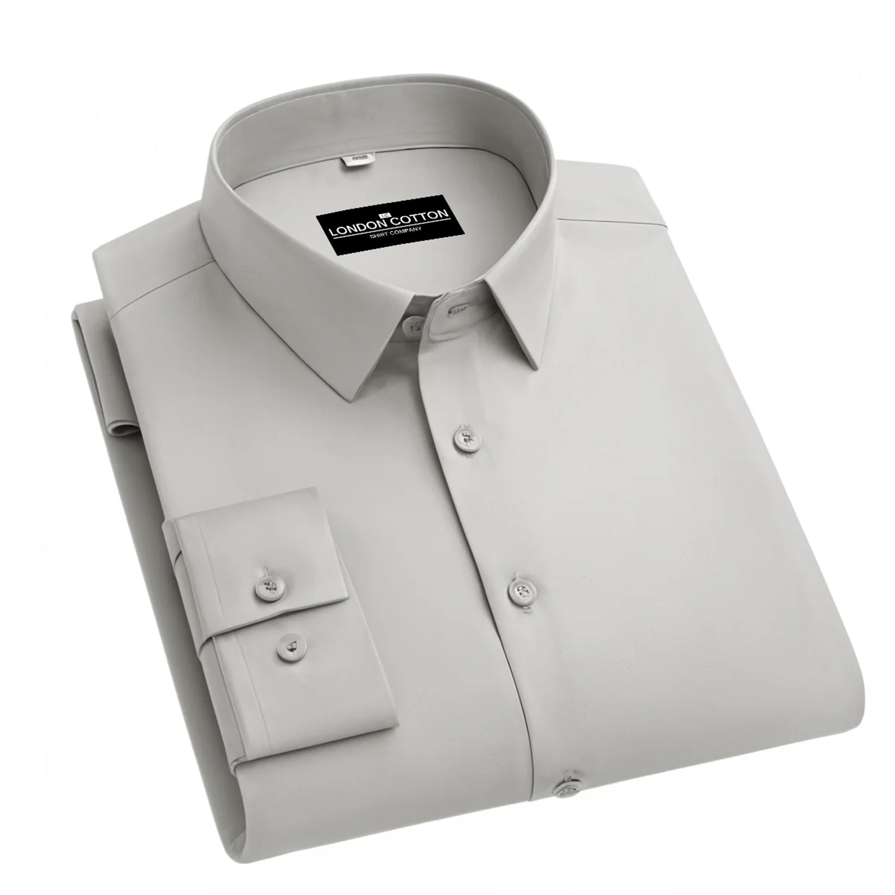Folded light gray dress shirt with 'London Cotton' label on a white background