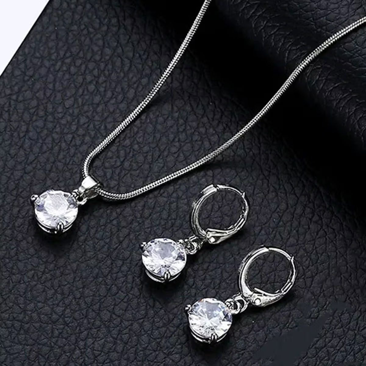 Jazz and Sizzle Rhodium Plated AD Studded Pendent Chain & Earrings