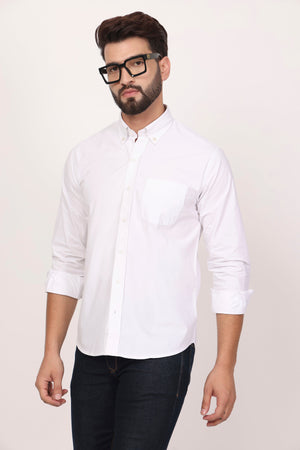 A male model wearing a white down button casual shirt with full sleeves, made of cotton twill fabric.