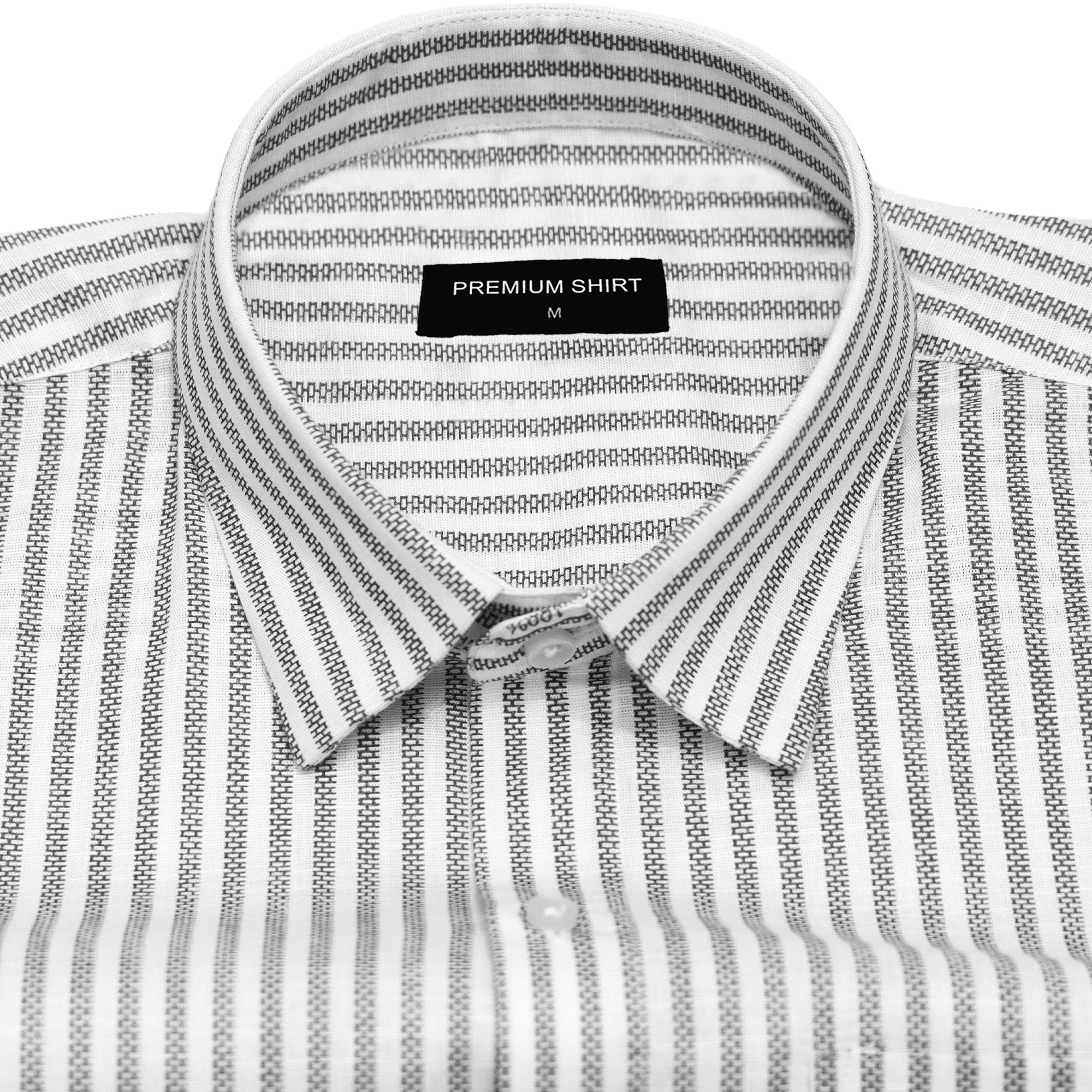 Folded striped shirt with a 'Premium Shirt' label on a white background