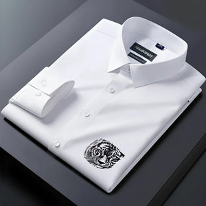 White dress shirt with a tiger emblem on a dark background