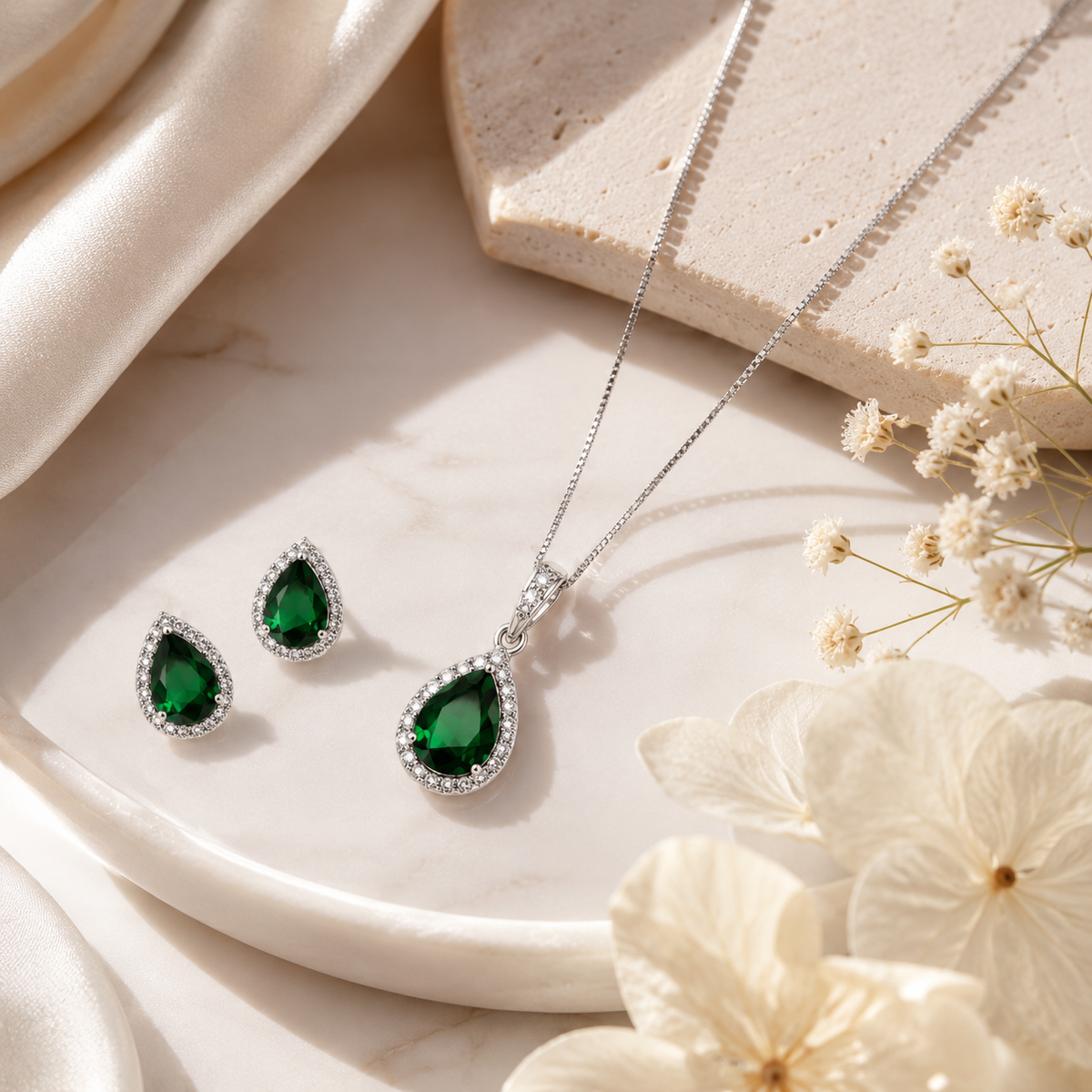 Jazz And Sizzle Sparkling Royal Elegance Emerald Glow Drop American Diamond Pendant &amp; Earrings Set