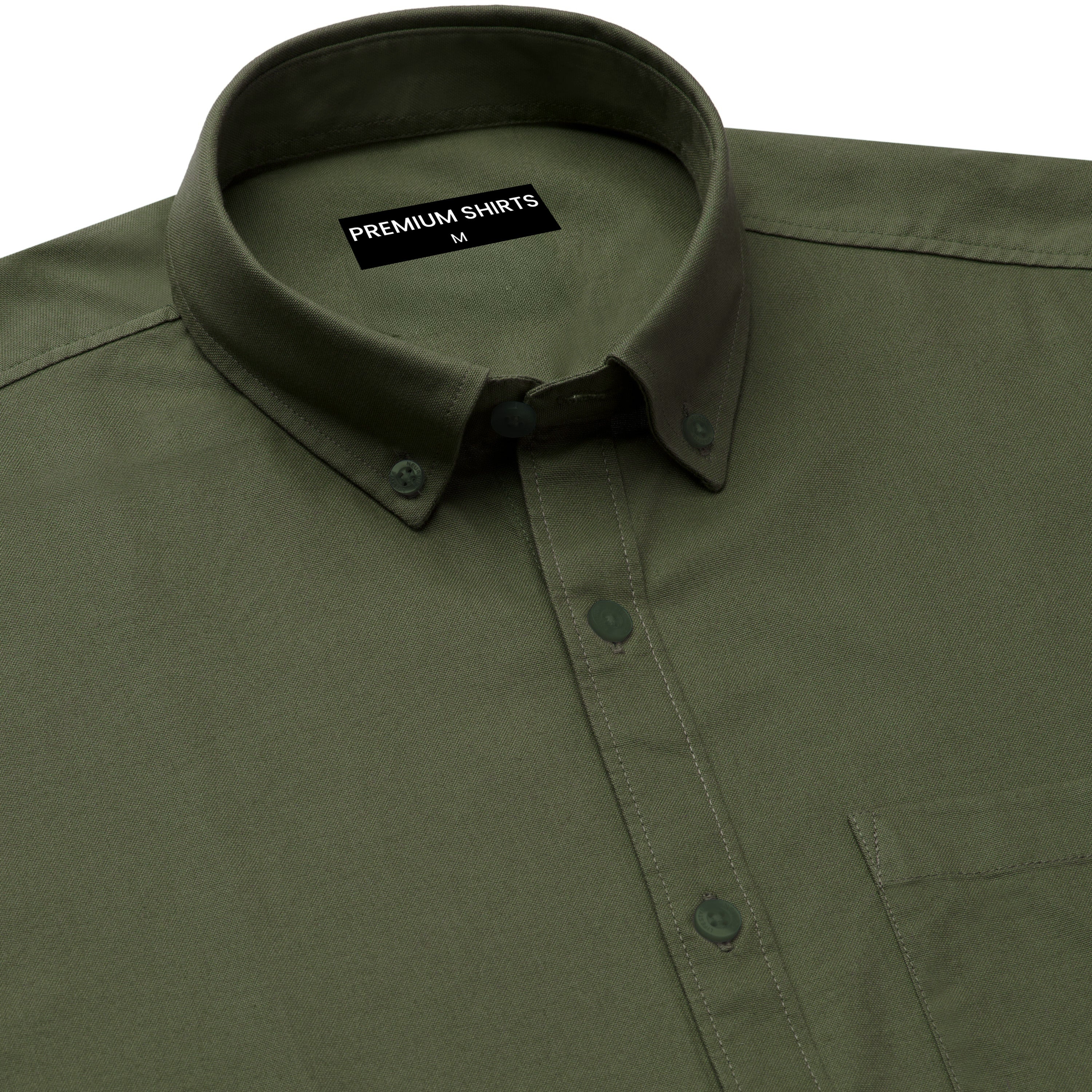 Green shirt with collar and button details, featuring a brand label.