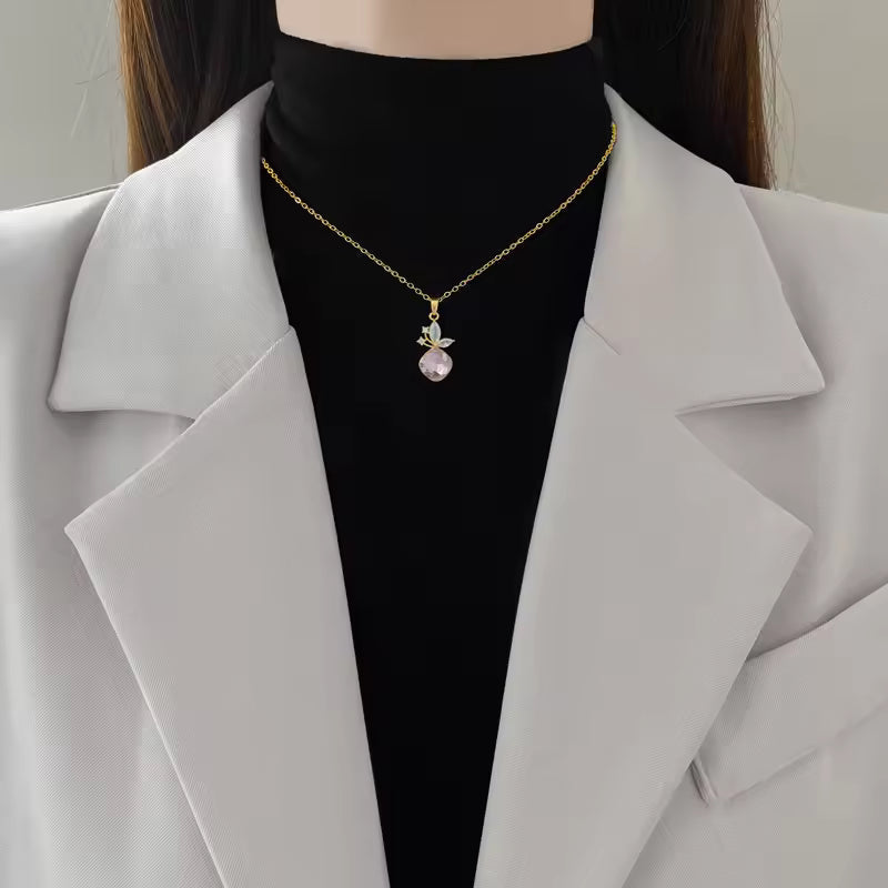 Jazz And Sizzle Pink Stone Studded Stylish Gold Plated Knot Pattern Necklace
