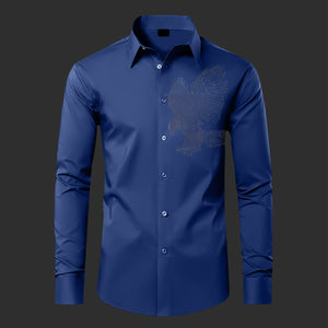 Blue dress shirt with a decorative eagle emblem on a dark background