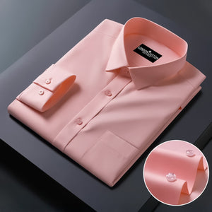 Pink dress shirt with a close-up of the collar on a dark background