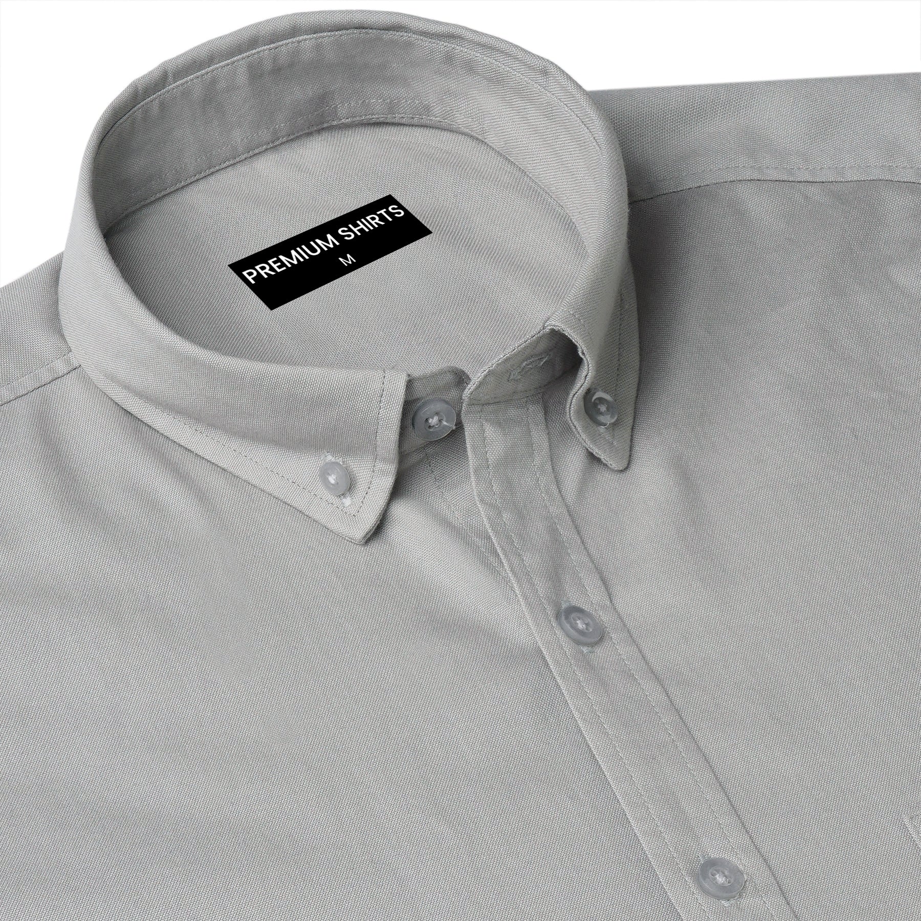 Gray shirt with a collar tag labeled 'Premium Shirts' on a white background
