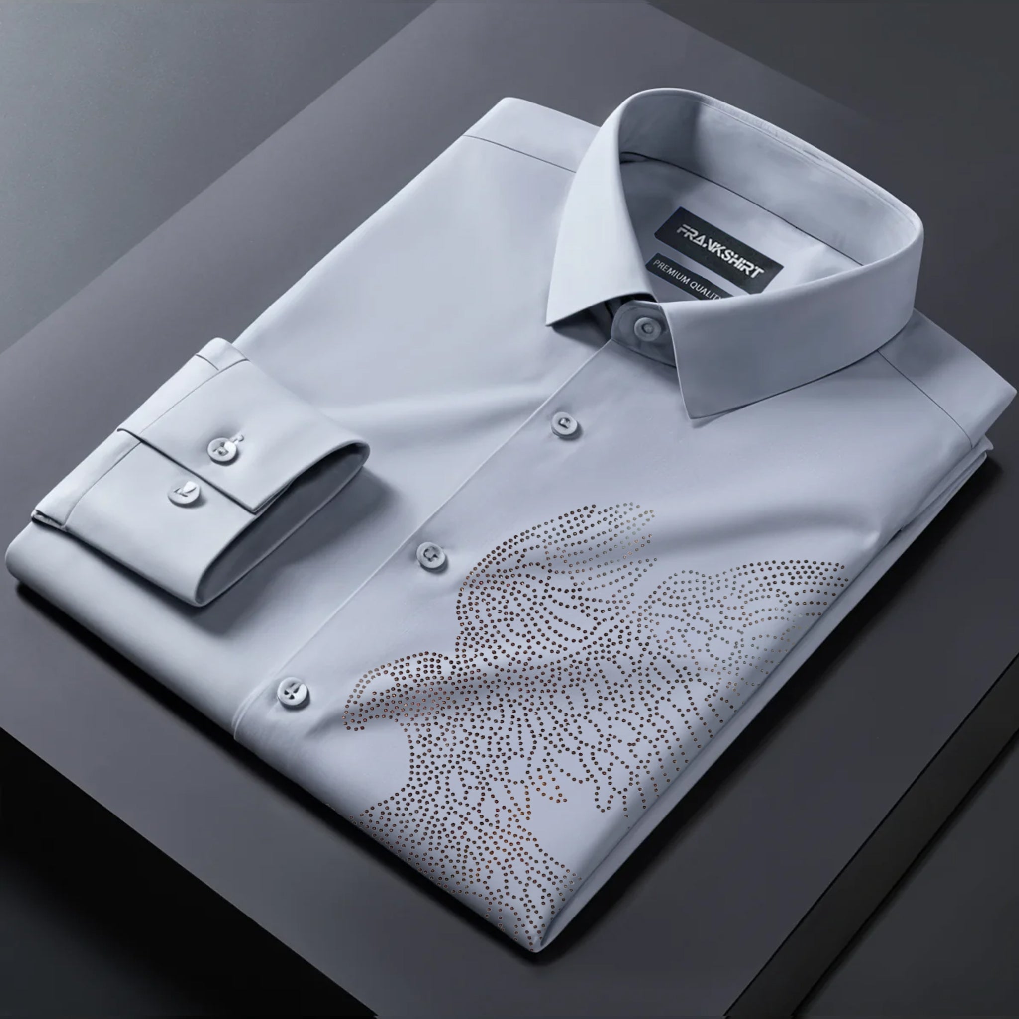 Gray dress shirt with floral pattern on a dark surface