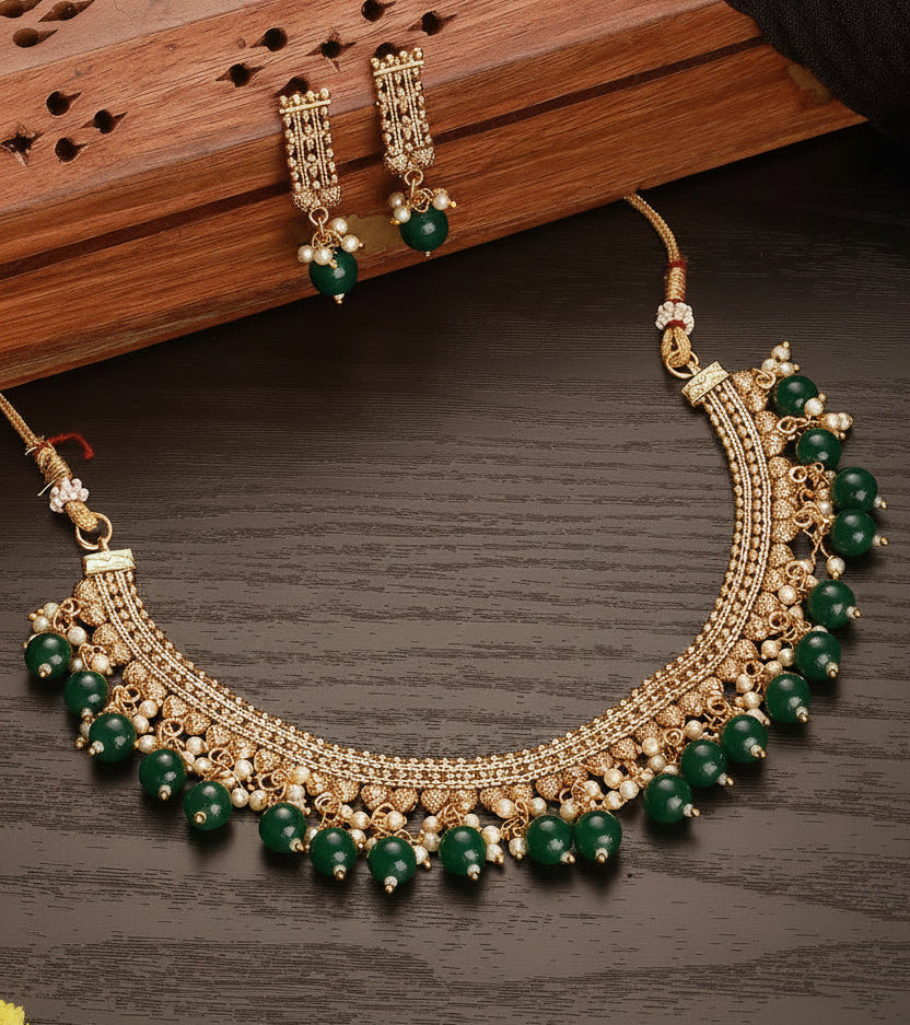 Jazz And Sizzle Gold-Plated Kundan-Studded & Green Pearls Beaded Necklace &Earrings Set
